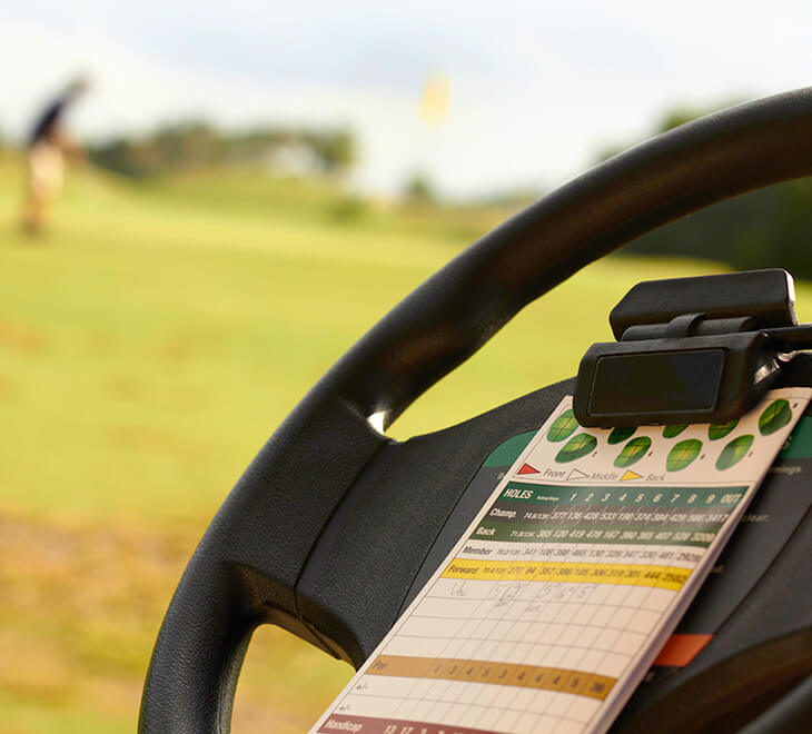 golf cart and scorecard